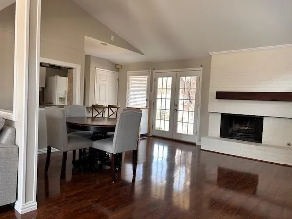 a view of a livingroom with furniture and a fireplace