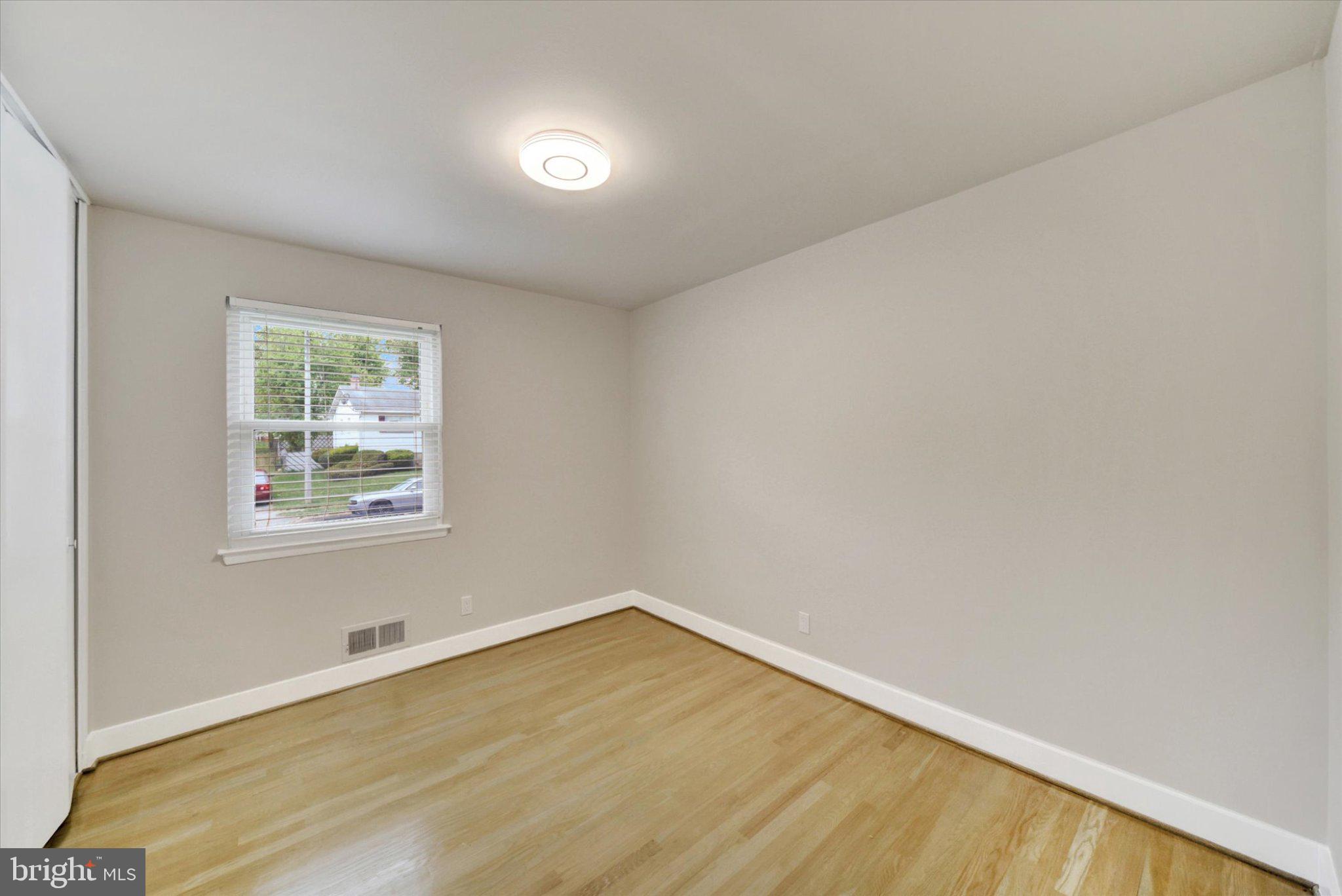3709 Lamoine Road Randallstown, MD 21133 - Photo 10 of 25 an empty room with a window
