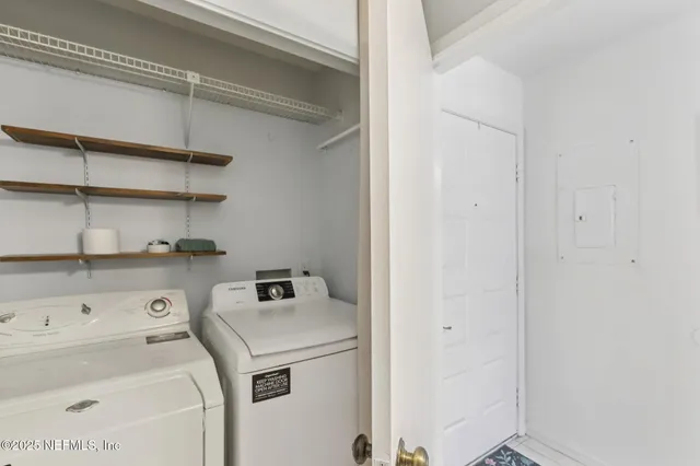 a utility room with dryer and washer