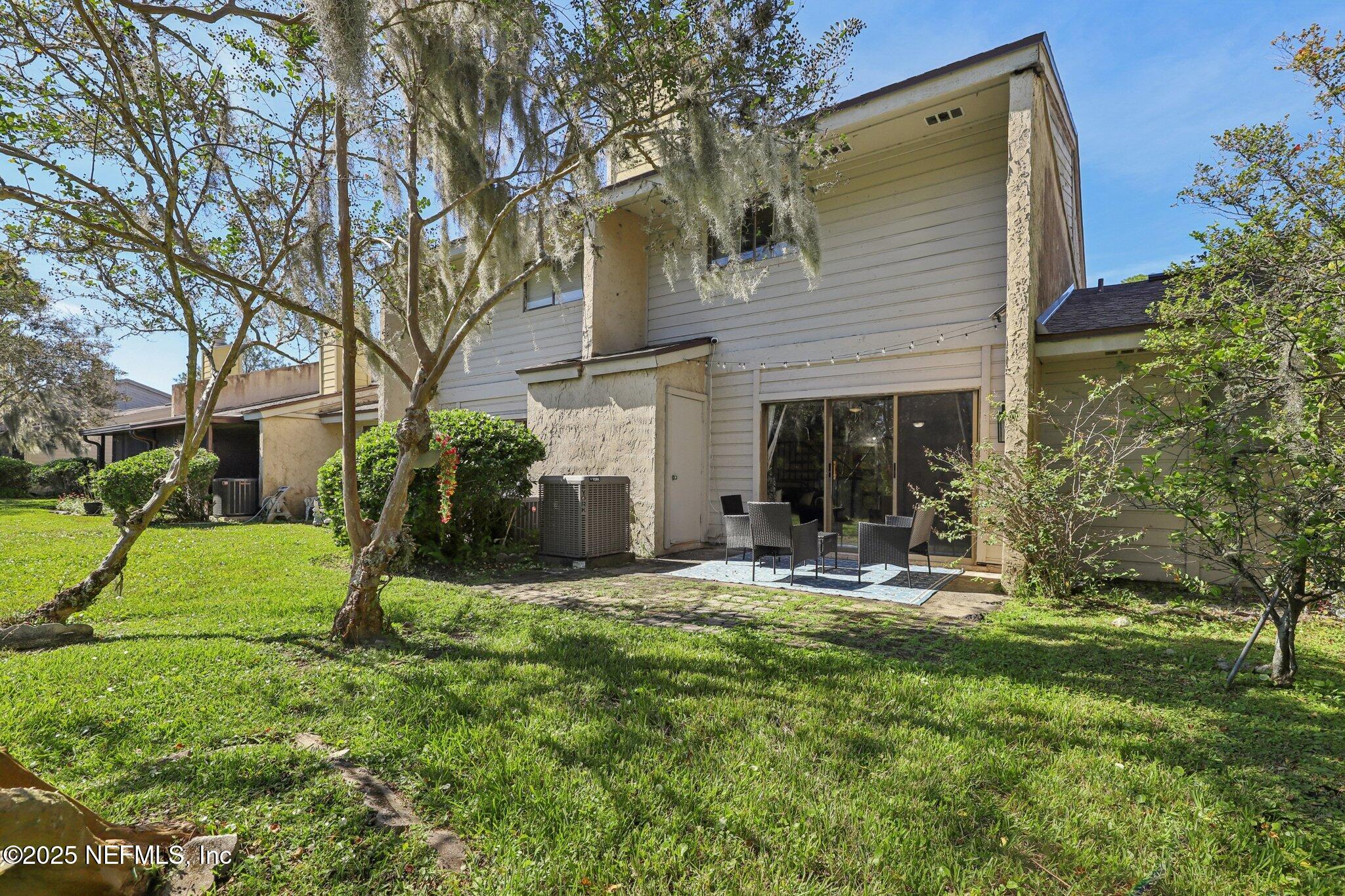 3801 Crown Point Road, Unit 1263 Jacksonville, FL 32257 - Photo 29 of 33 front view of a house with a yard