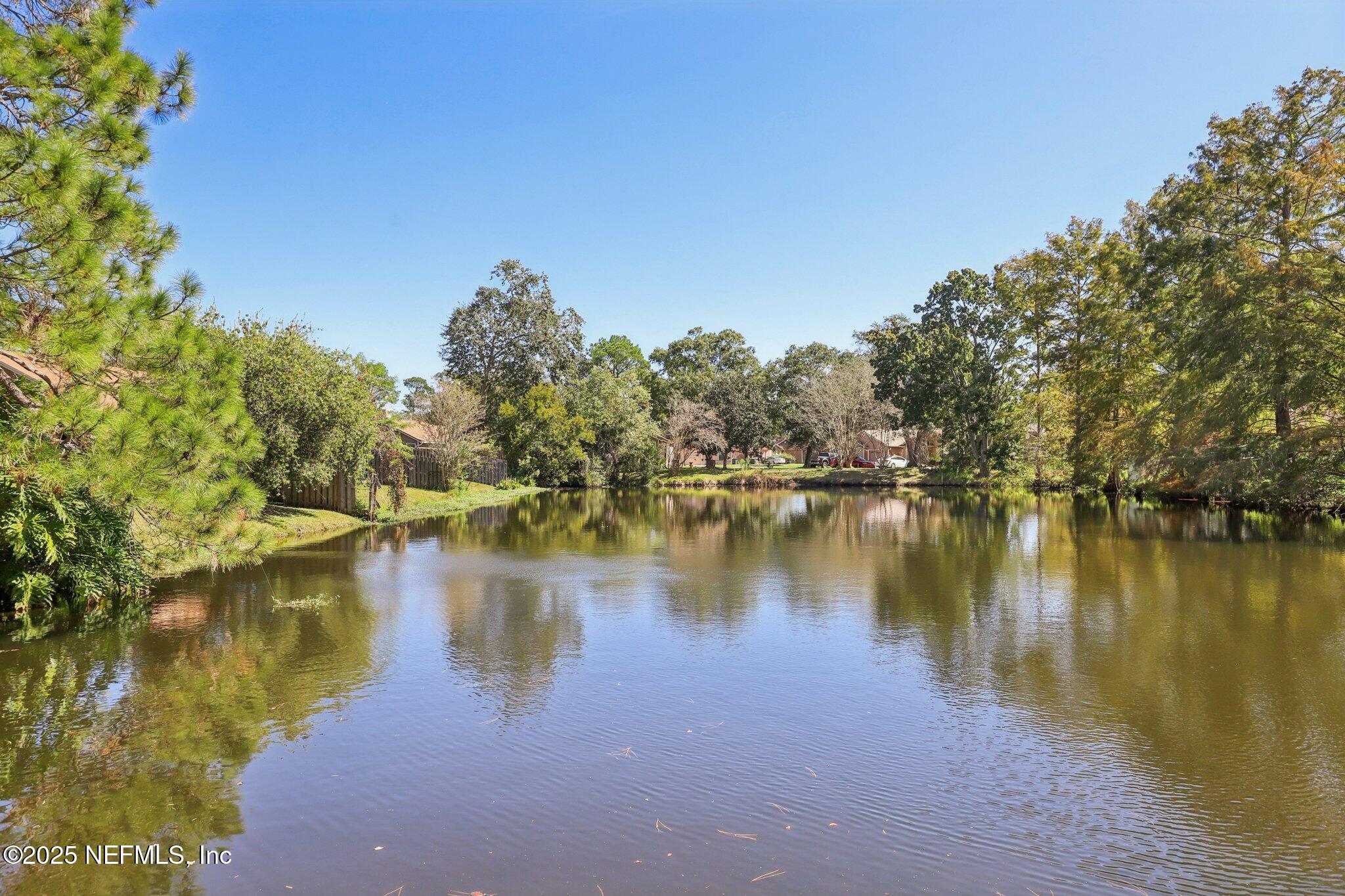 3801 Crown Point Road, Unit 1263 Jacksonville, FL 32257 - Photo 33 of 33 a view of a lake with houses