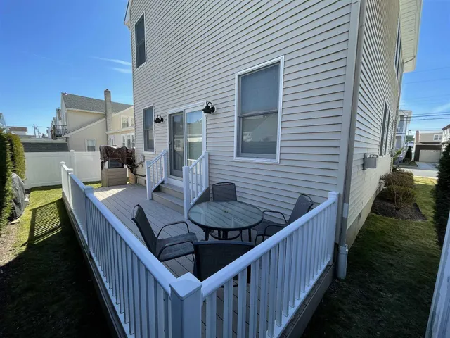a view of a balcony and chairs