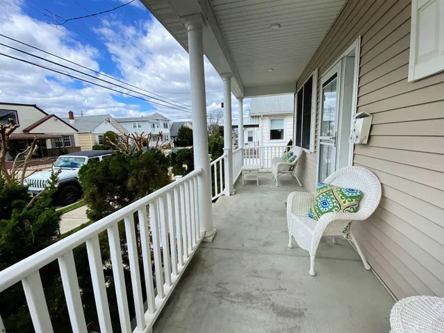 a view of a porch with furniture