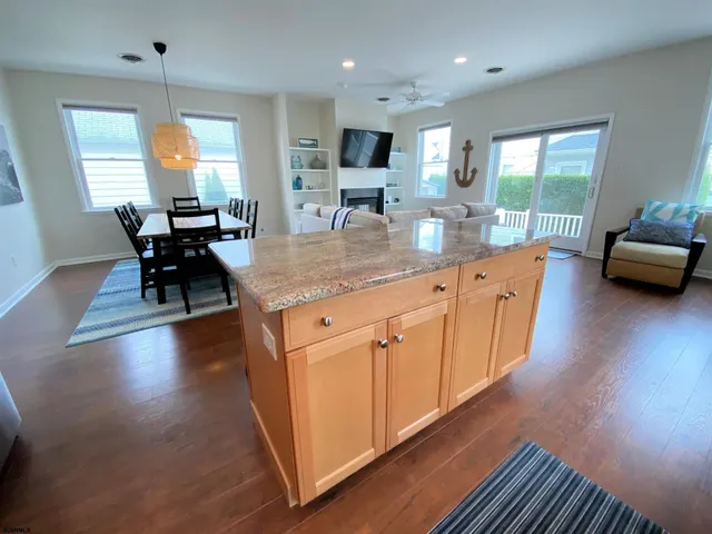 a kitchen with sink and cabinets