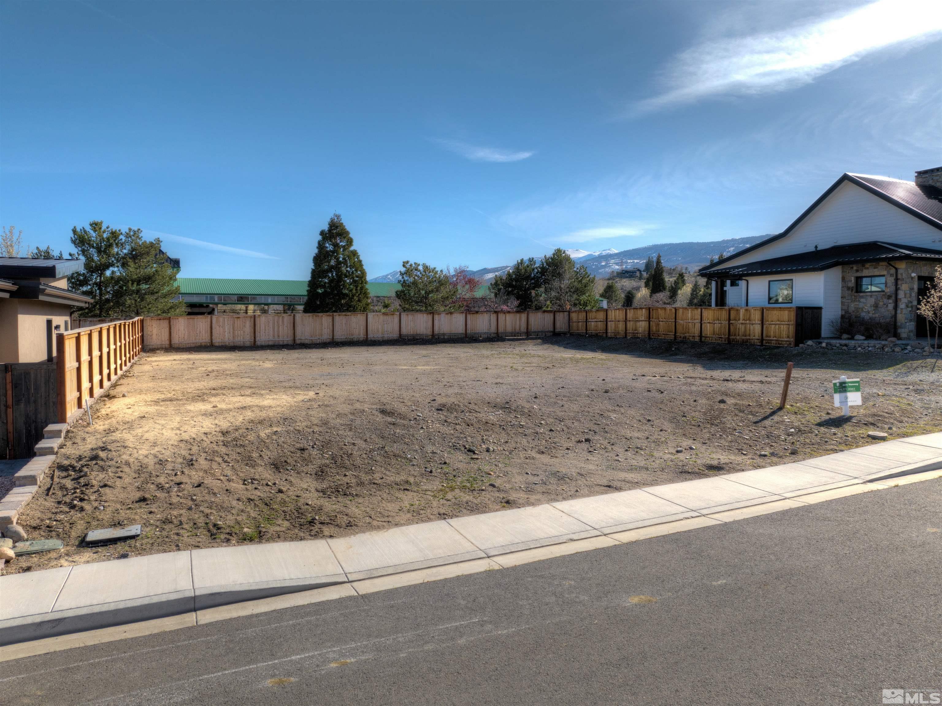 726 Canter Way Reno, NV 89511 - Photo 8 of 11 a view of a yard in front of a house