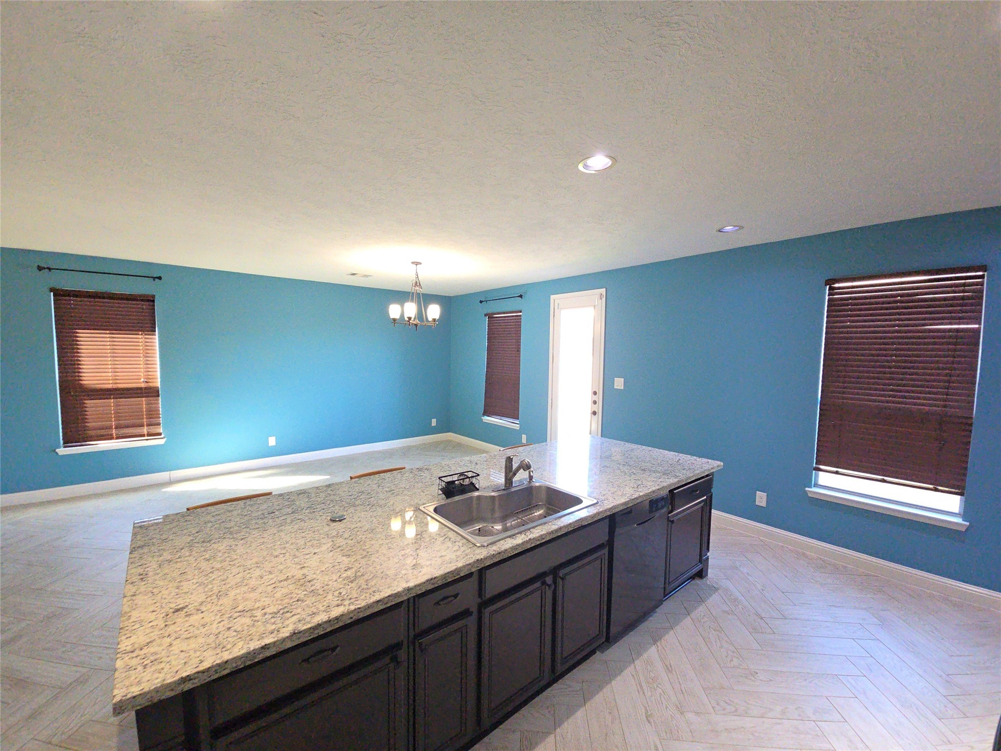 16014 Peach Bluff Lane Cypress, TX 77429 - Photo 16 of 26 a bathroom with a granite countertop sink and a large mirror