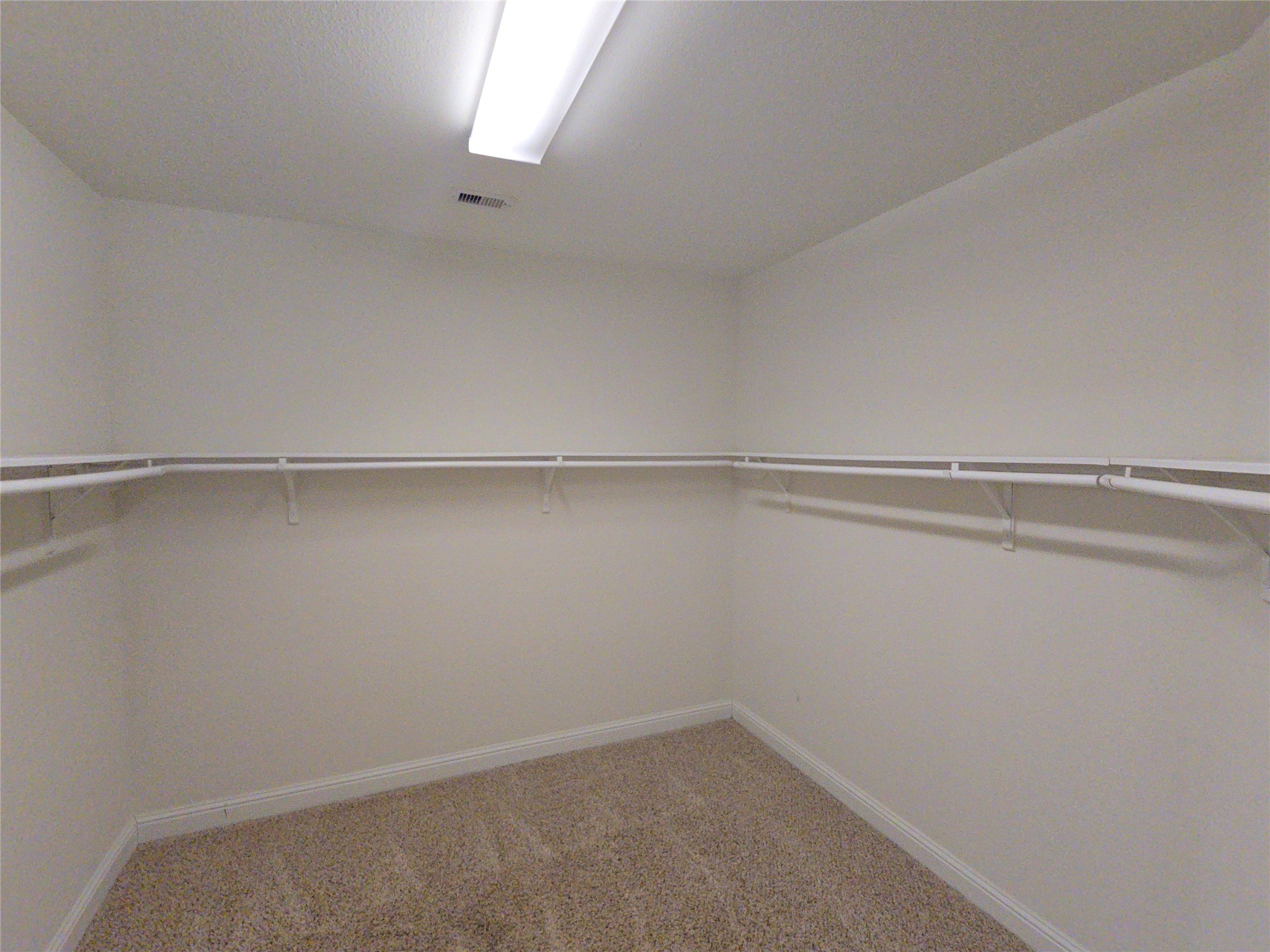 16014 Peach Bluff Lane Cypress, TX 77429 - Photo 18 of 26 a view of an empty walk in closet