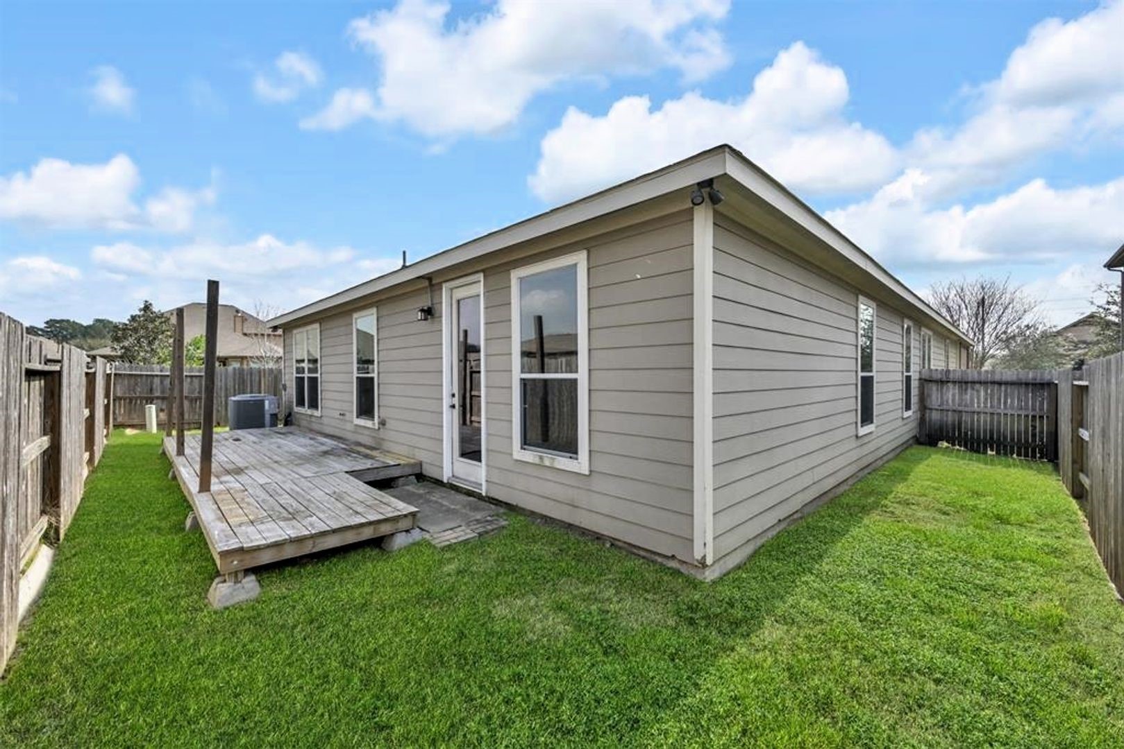 16014 Peach Bluff Lane Cypress, TX 77429 - Photo 24 of 26 a view of a back yard of the house