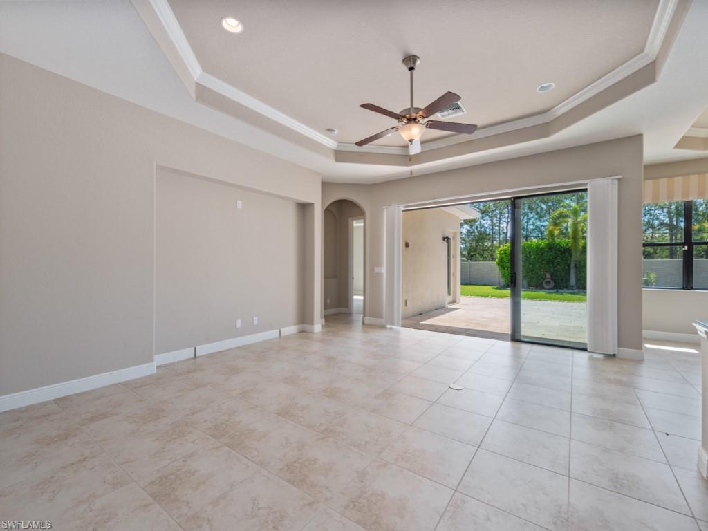 1638 Serrano Circle Naples, FL 34105 - Photo 12 of 23 a view of an empty room with a window