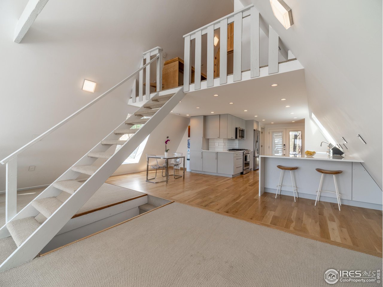 8423 Middle Fork Road Boulder, CO 80302 - Photo 11 of 40 a view of entryway and hall with wooden floor