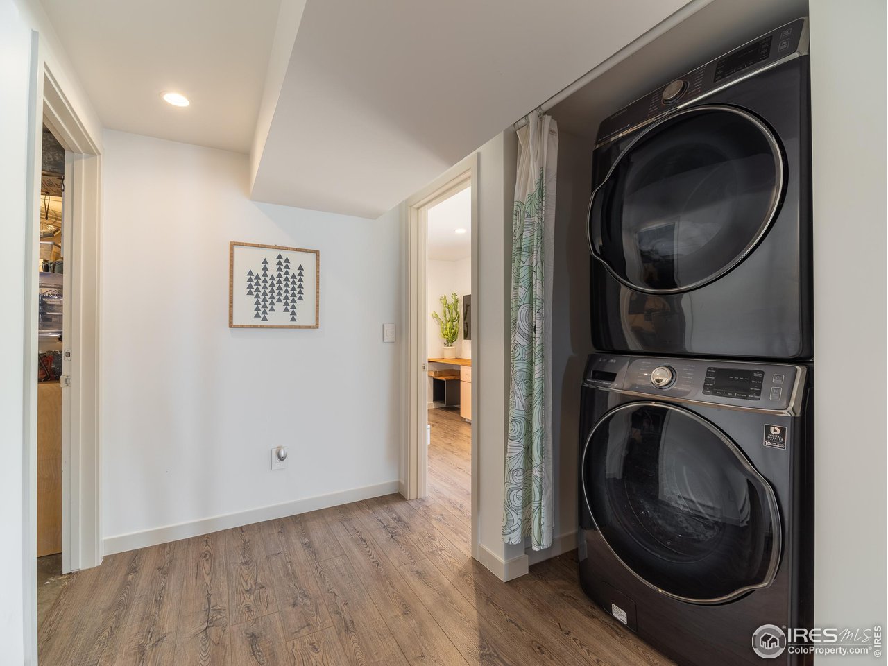 8423 Middle Fork Road Boulder, CO 80302 - Photo 29 of 40 a view of a hallway with washer and dryer