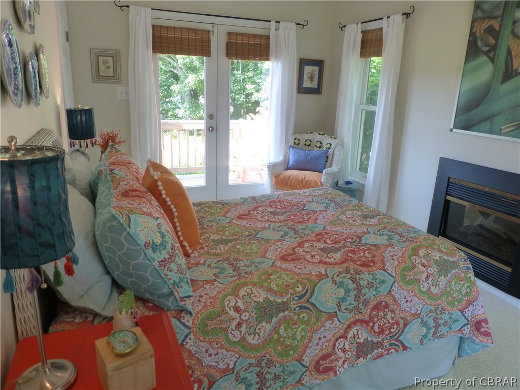 864 Mill Wharf Road Wake, VA 23176 - Photo 16 of 31 Bedroom 2 on first floor. Also has electric fireplace and private deck via French Doors!