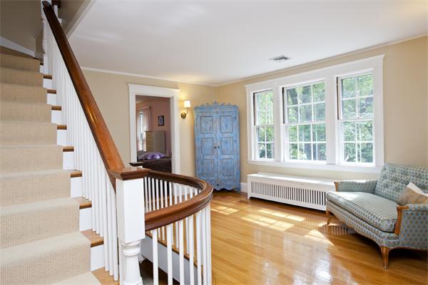 32 Arlington Road Wellesley, MA 02481 - Photo 16 of 29 a living room with furniture and stairs