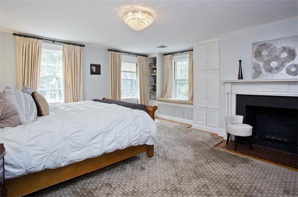 32 Arlington Road Wellesley, MA 02481 - Photo 17 of 29 a spacious bedroom with a bed and a window