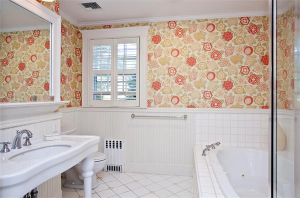 32 Arlington Road Wellesley, MA 02481 - Photo 18 of 29 a bathroom with a sink and a mirror