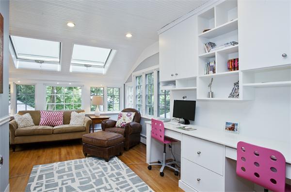 32 Arlington Road Wellesley, MA 02481 - Photo 21 of 29 a living room with furniture and a flat screen tv