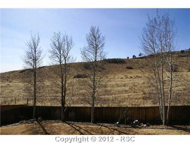 2175 Wickes Road Colorado Springs, CO 80919 - Photo 14 of 16 Private Back Yard, Fully Landscaped, Walking Trail.