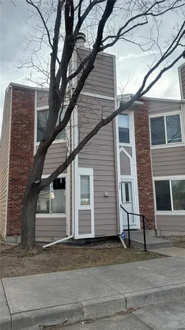 a view of a house with a street