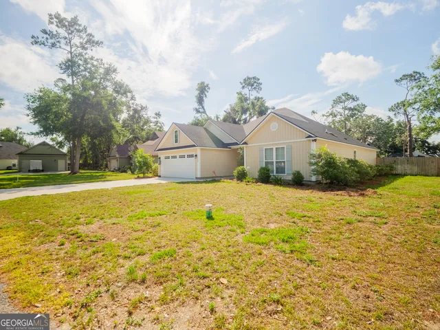 a house view with swimming pool in front of it