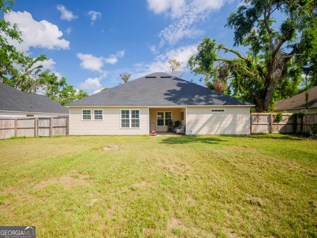 a front view of a house with swimming pool