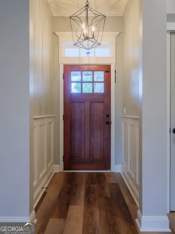 a view of entryway with chandelier