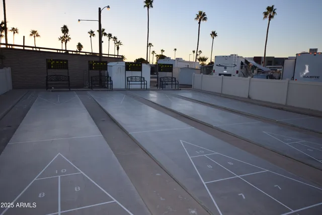 a view of a swimming pool with a lounge chair