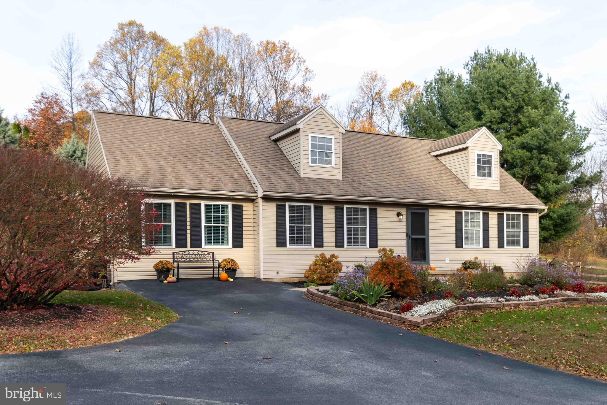 front view of a house with a yard