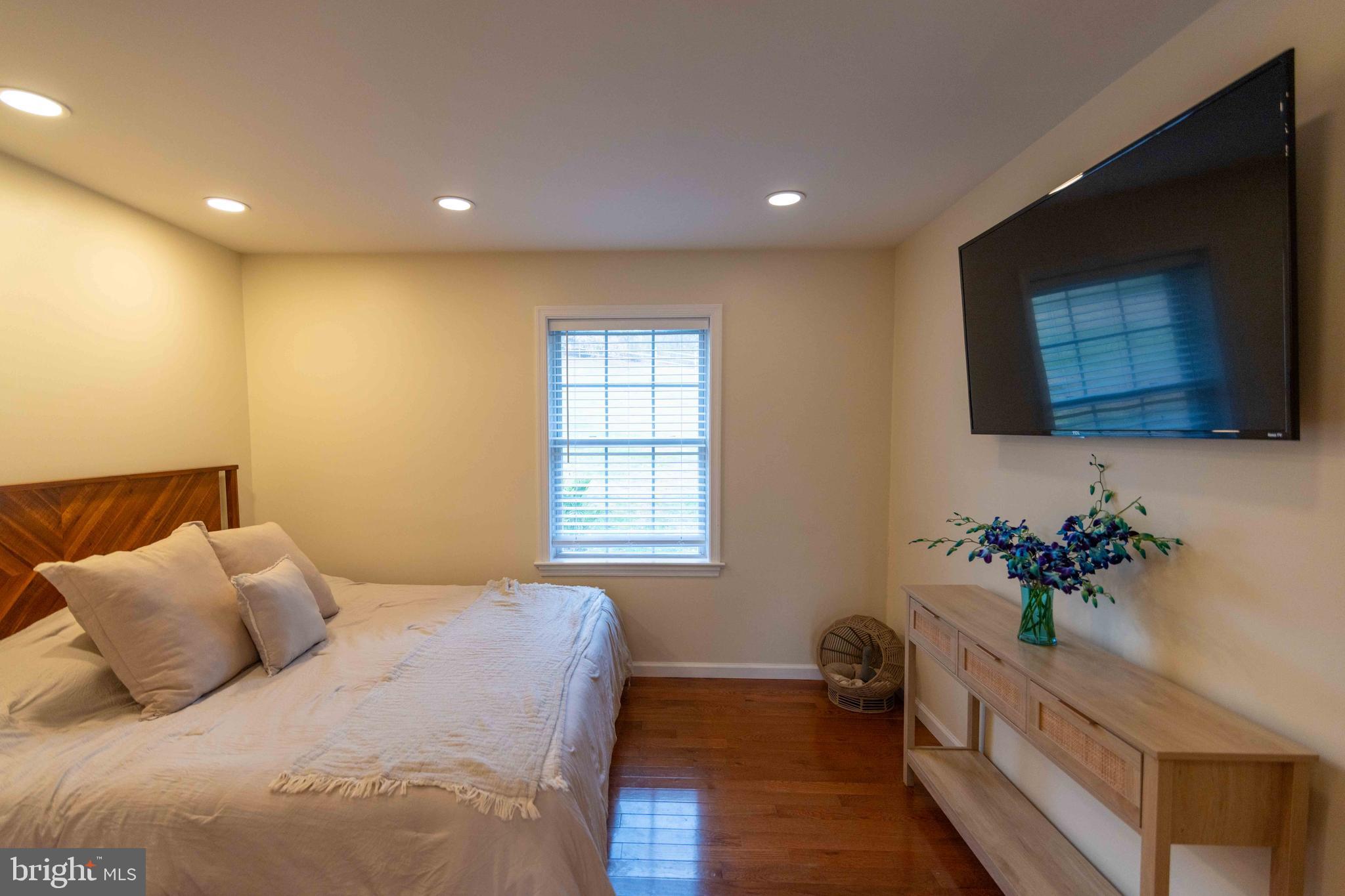 151 South Sandy Hill Road Coatesville, PA 19320 - Photo 28 of 91 a bedroom with a bed and a potted plant