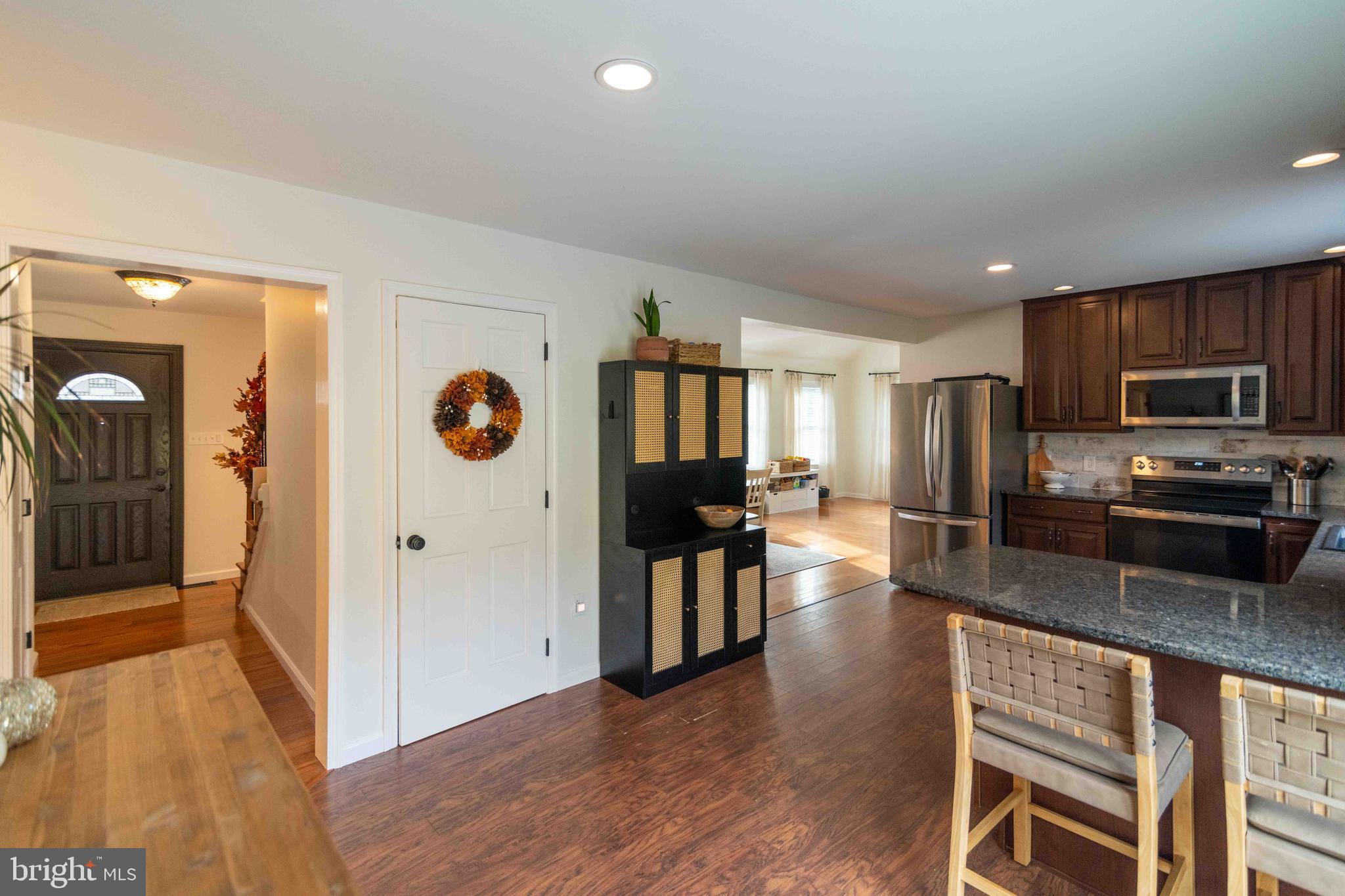 151 South Sandy Hill Road Coatesville, PA 19320 - Photo 41 of 91 a kitchen with stainless steel appliances granite countertop a refrigerator and stove
