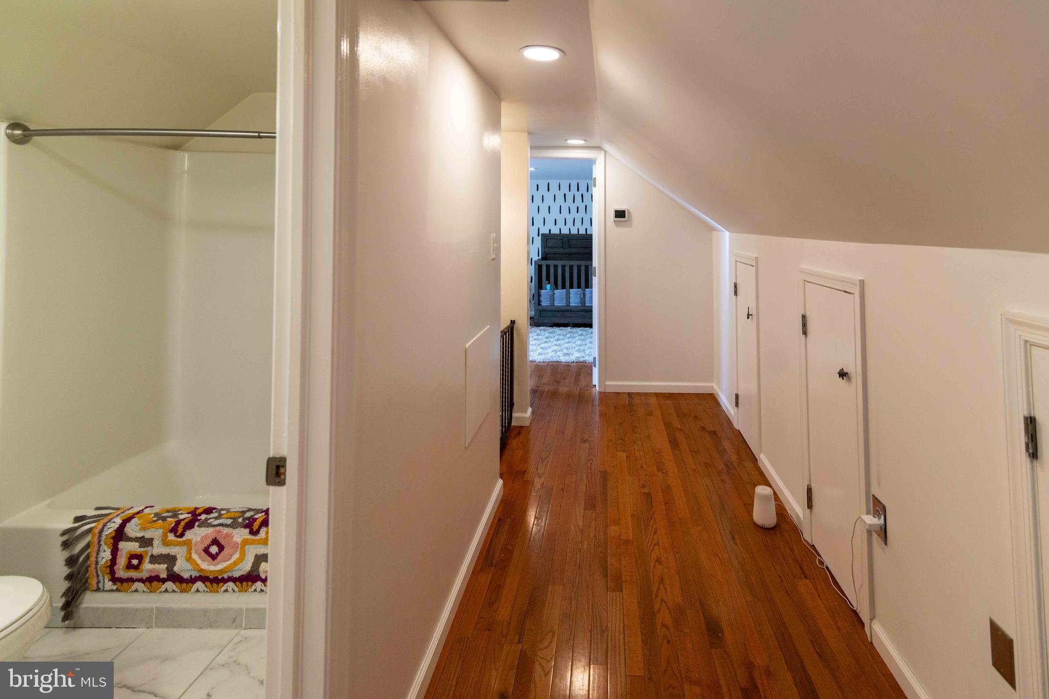 151 South Sandy Hill Road Coatesville, PA 19320 - Photo 46 of 91 a view of a hallway with wooden floor and closet