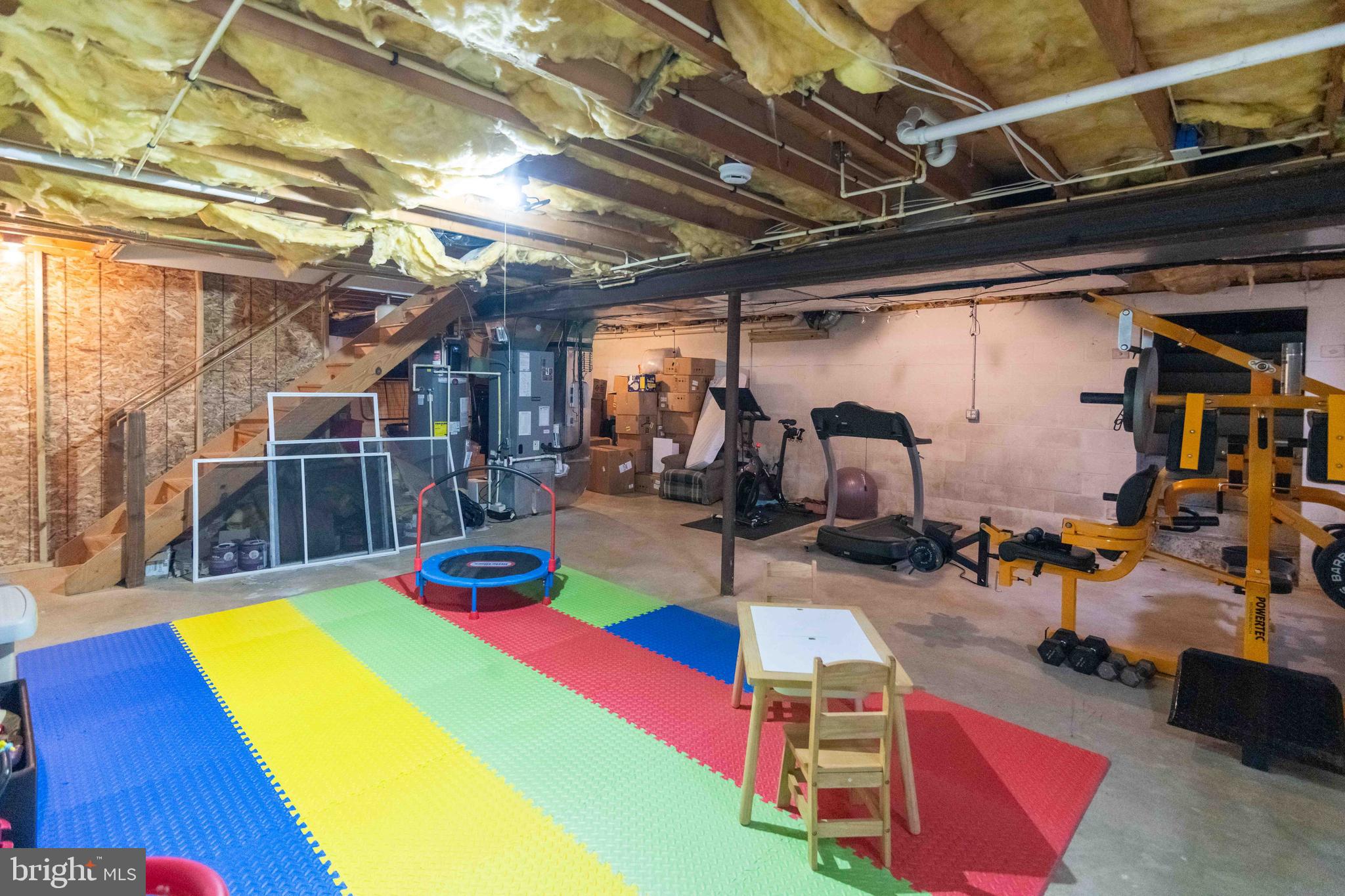 151 South Sandy Hill Road Coatesville, PA 19320 - Photo 57 of 91 a room with gym equipment and wooden floor