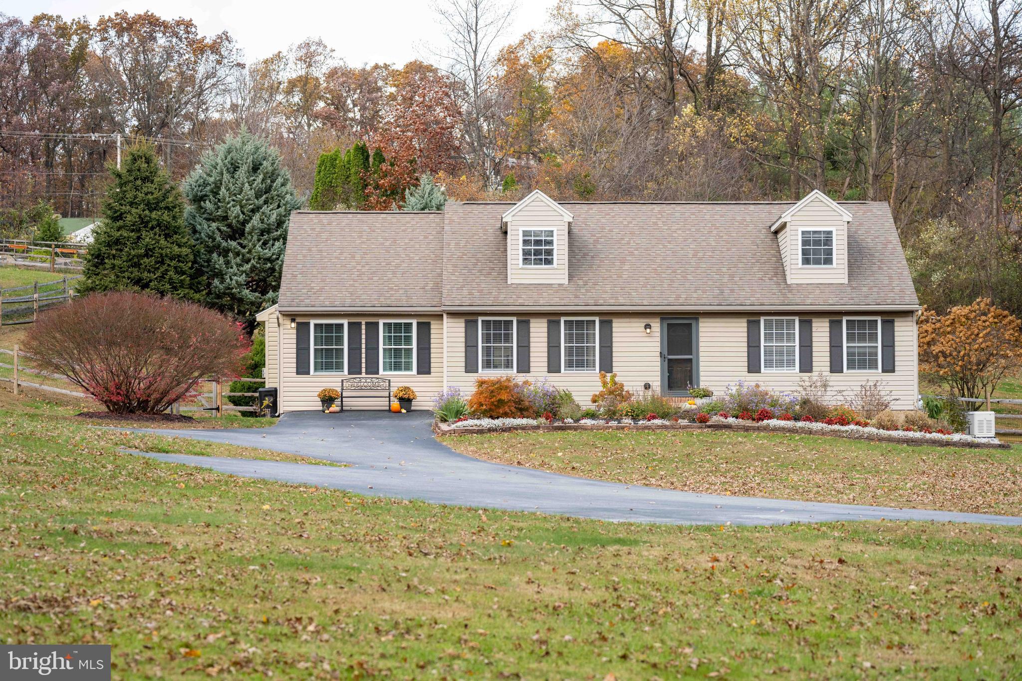 151 South Sandy Hill Road Coatesville, PA 19320 - Photo 6 of 91 a view of a house with a yard and sitting area