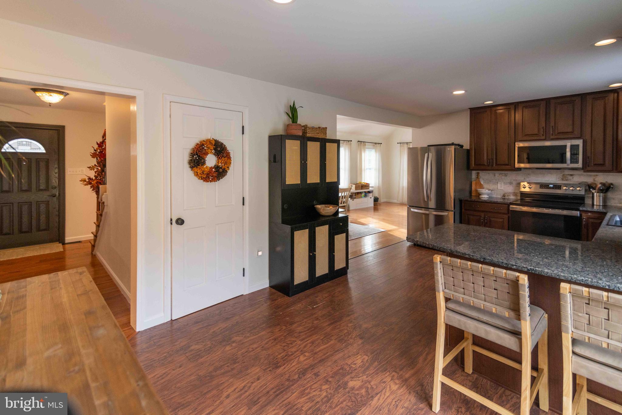 151 South Sandy Hill Road Coatesville, PA 19320 - Photo 10 of 91 a kitchen with stainless steel appliances granite countertop a refrigerator and a stove top oven