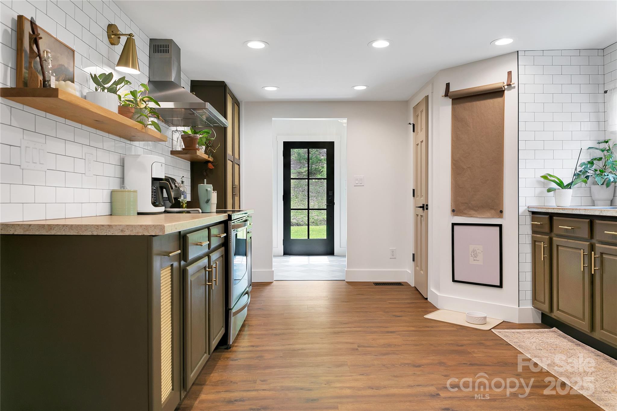 903 Middlefork Road Brevard, NC 28712 - Photo 14 of 45 a bathroom with a sink a mirror and a shower