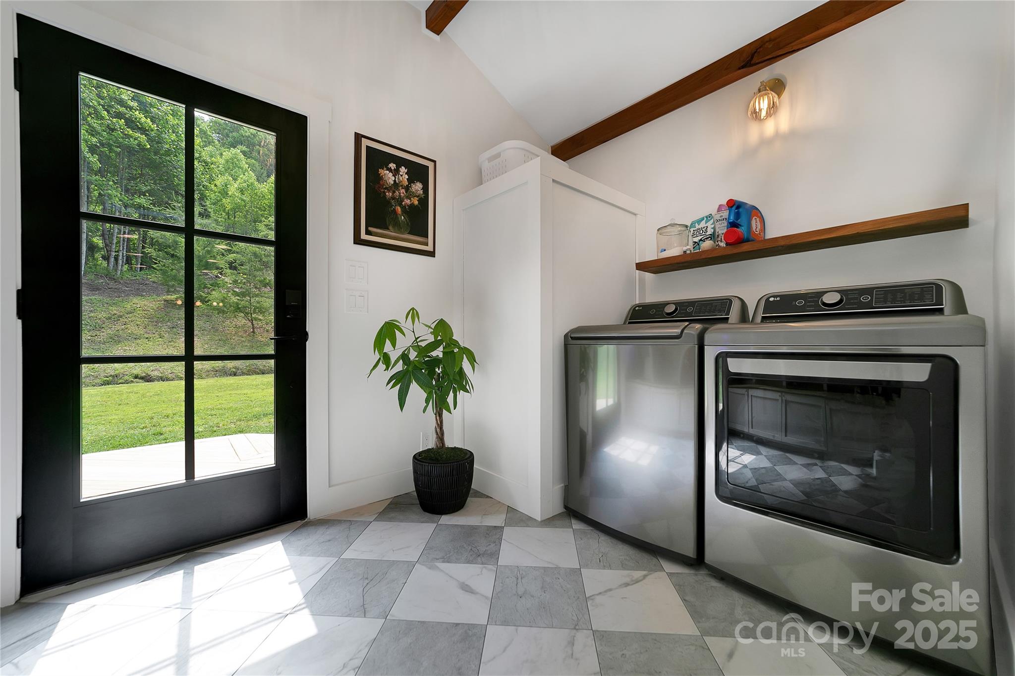 903 Middlefork Road Brevard, NC 28712 - Photo 16 of 45 a living room with furniture and a potted plant
