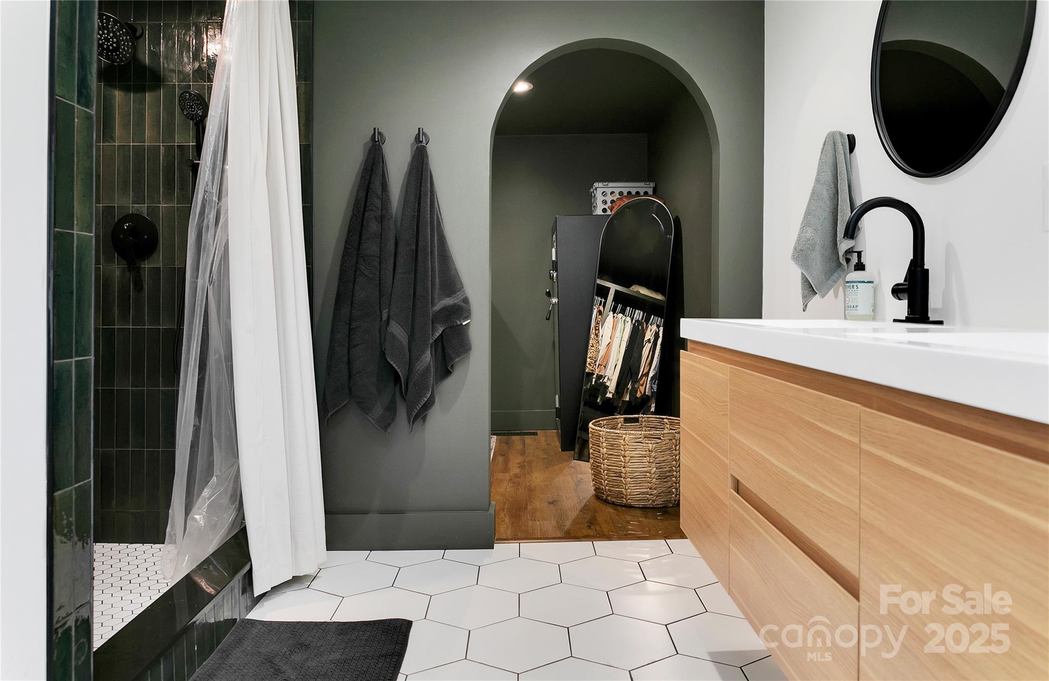 903 Middlefork Road Brevard, NC 28712 - Photo 29 of 45 a bathroom with a sink and mirror