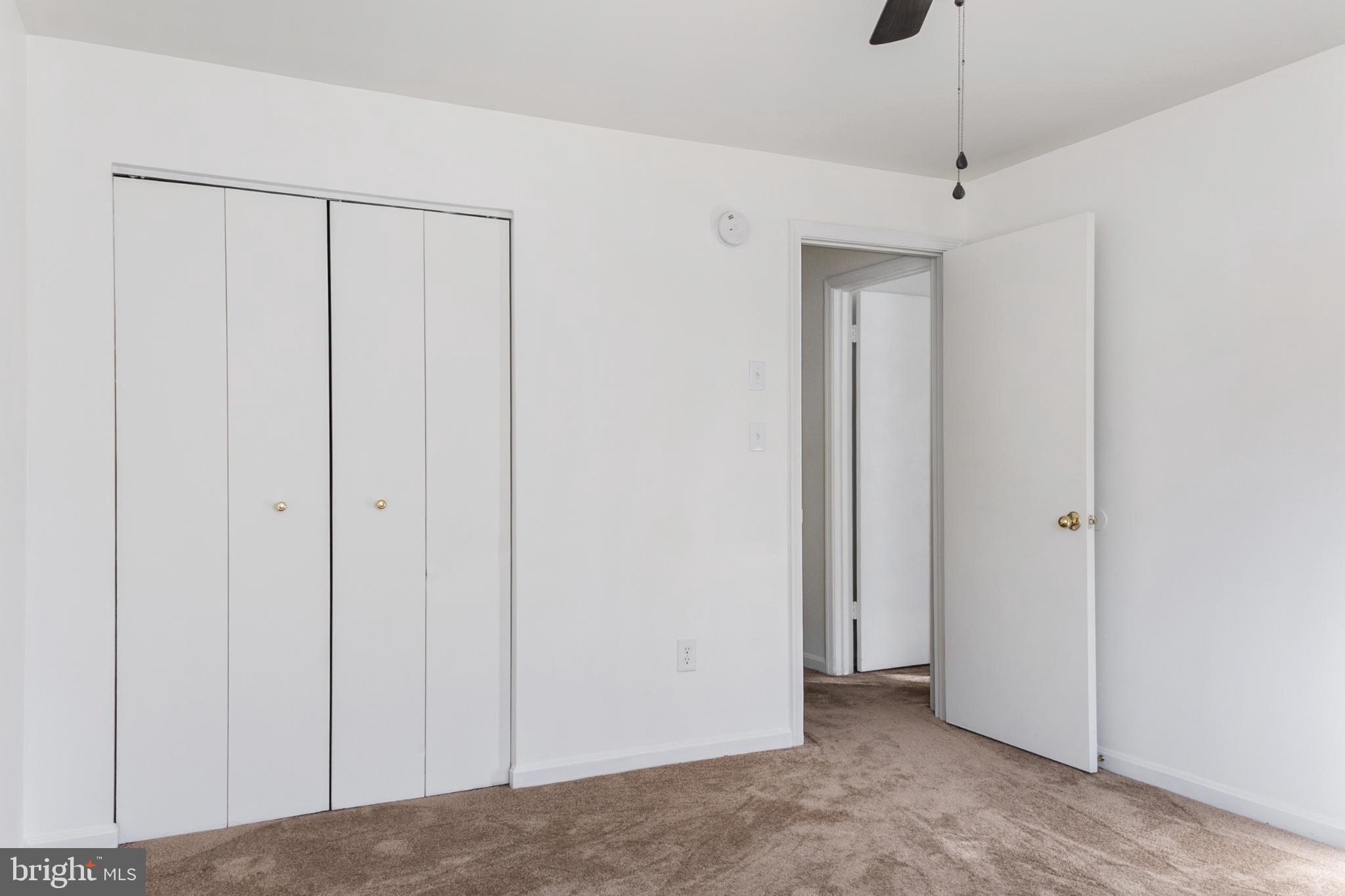 103 Three Coin Way, Unit 104 Glen Burnie, MD 21060 - Photo 12 of 19 a view of a room with an entryway