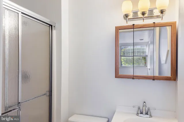 a house view with a sitting space and garden