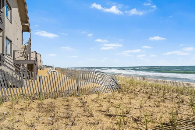 a view of a lake with a building in the background
