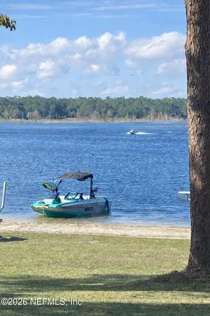 a view of a lake from a yard