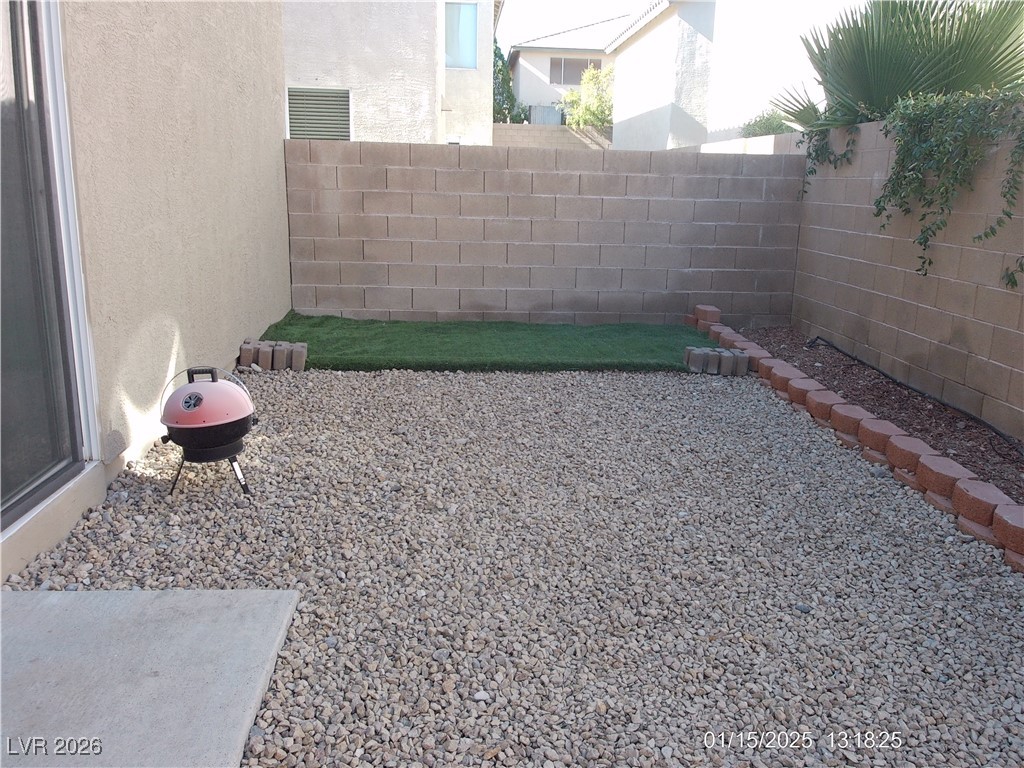 7332 Ribbon Ridge Avenue Las Vegas, NV 89129 - Photo 25 of 28 View of fenced backyard