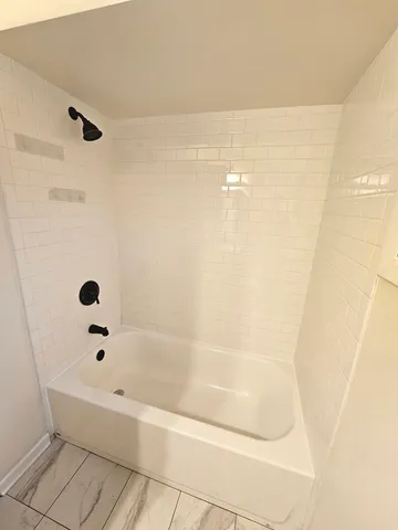 a bathroom with a bathtub