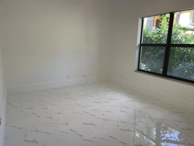 an empty room with a window