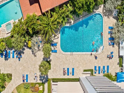 an aerial view of a house with a garden