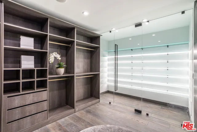 a view of an empty walk in closet