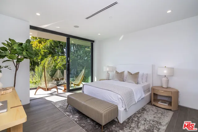 a large room with lots of table and chairs