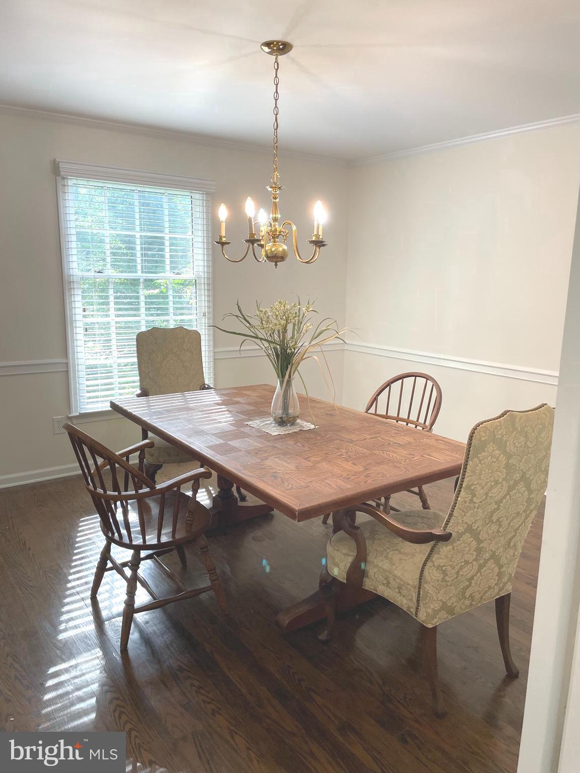 611 Andover Road Newtown Square, PA 19073 - Photo 13 of 27 a view of a dining room with furniture and wooden floor
