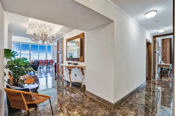 a living room with furniture a dining table with potted plants