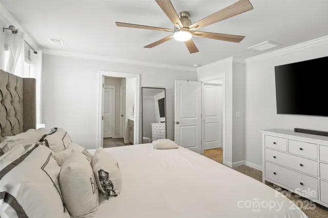 a bathroom with double vanity sinks and a large mirror