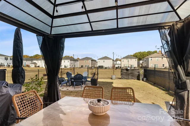 a view of an outdoor space with furniture